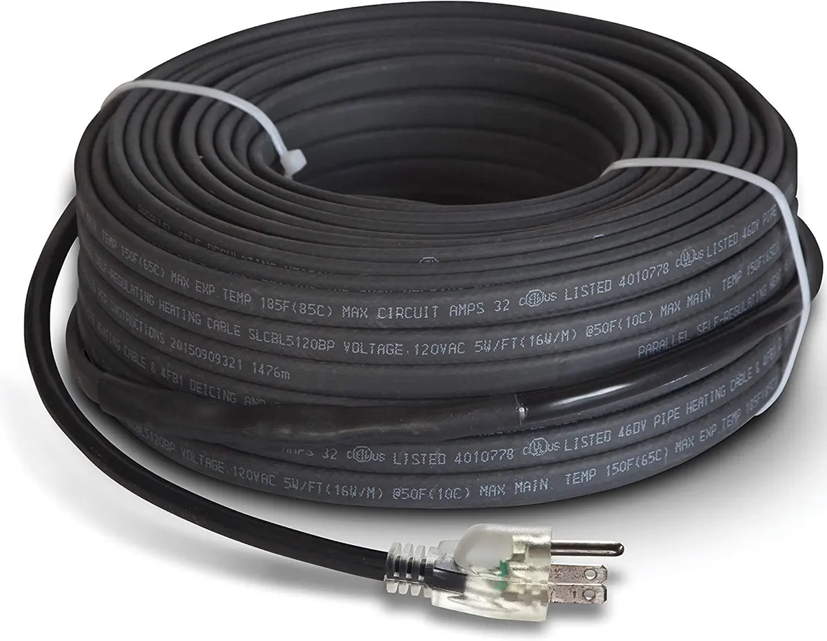 A coiled black electrical heating cable with white text markings along its length, secured with white ties. One end has a transparent three-prong plug.