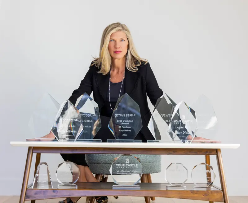 Amy Nakos with her Your Castle Summit production awards