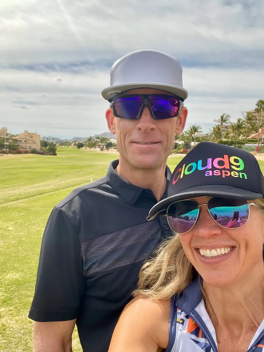 Amy and Darren golfing
