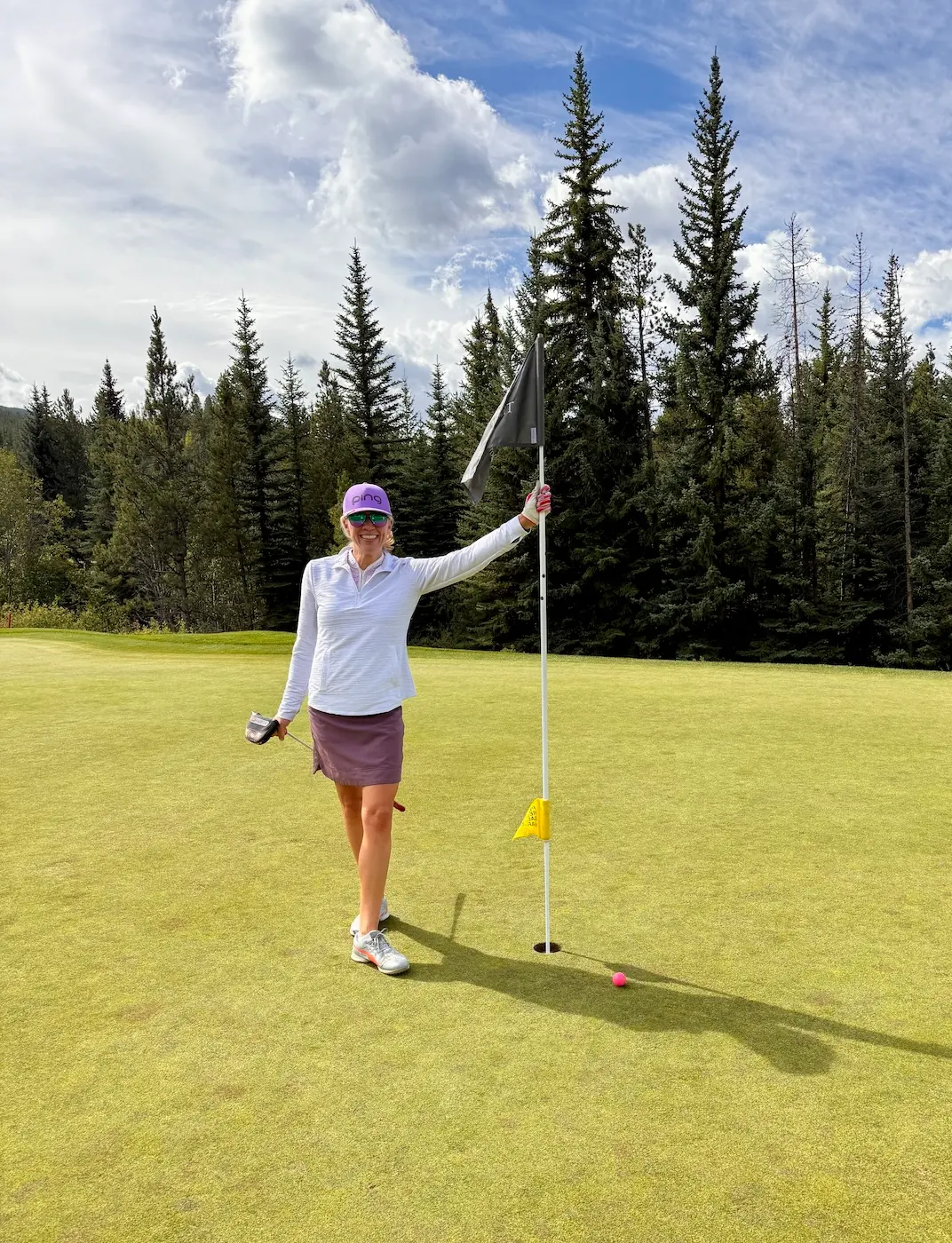 Amy golfing