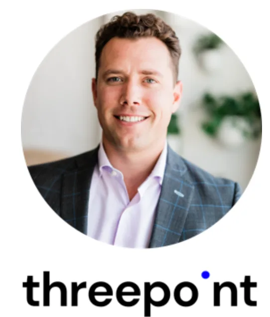 Smiling man in a suit jacket and light shirt poses in front of a blurred background with green plants. The word threepoint appears below with a blue dot above the i.